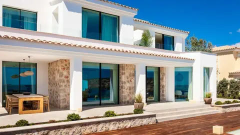 Un ejemplo de aplicaci&oacute;n de aislamiento SATE en una casa con un buen acabado exterior.